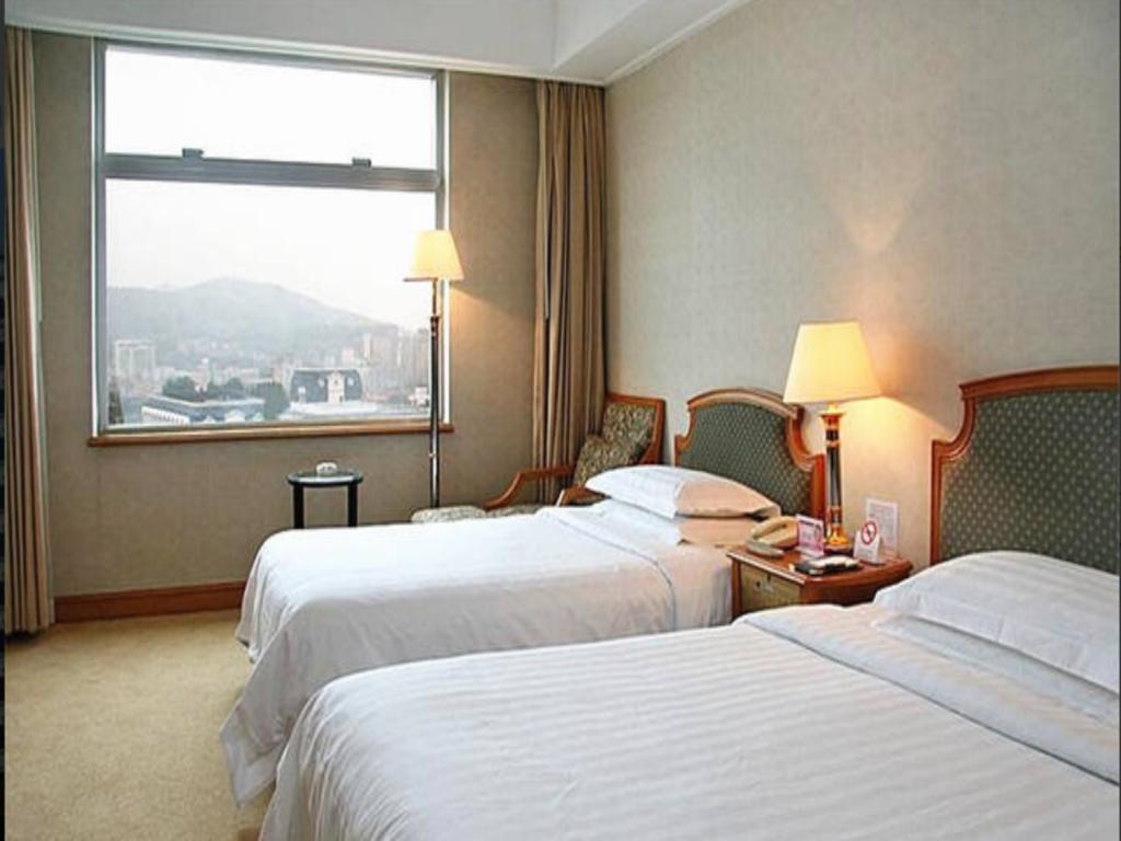 Sea Horizon Hotel Далиен Екстериор снимка